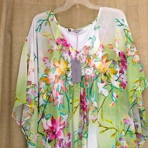 Jennifer Lopez Tropical Voyage dress size M, never worn.